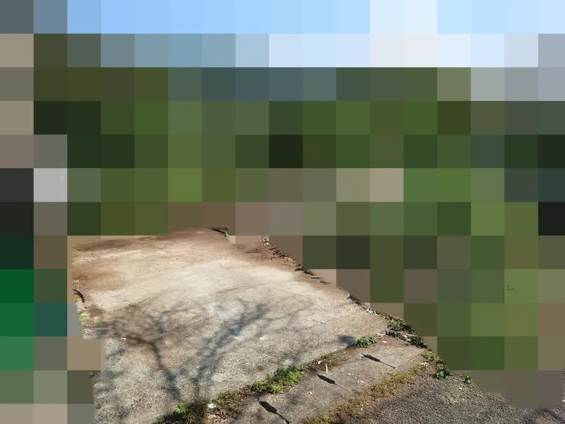 荒尾市での駐車場片付け後の様子。残置物が全て整理され、綺麗な更地の駐車場になりました